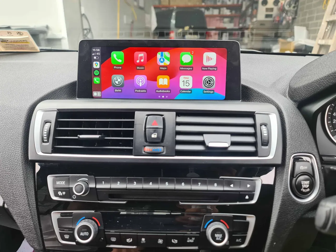 BMW 1 Series factory screen showing Apple CarPlay after a retrofit at Radio King