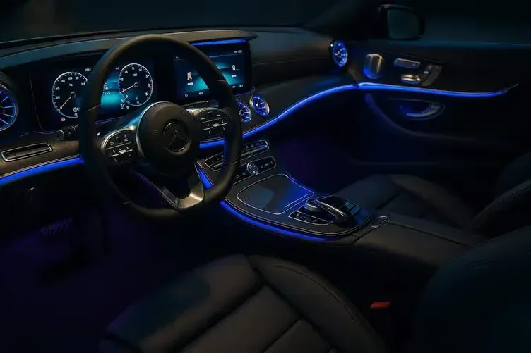 Fibre-optic ambient line running the length of the dashboard and centre console at night
