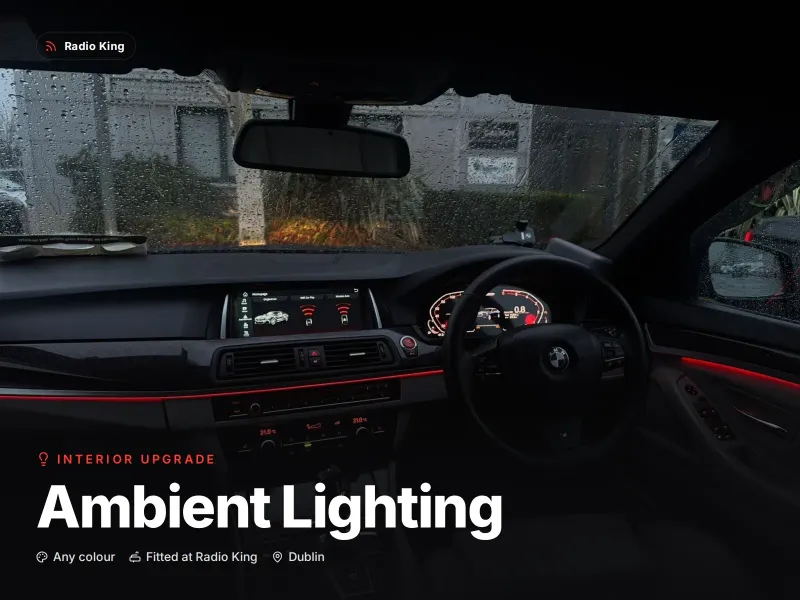 Car interior at night with fibre-optic ambient lighting running along the dashboard and door panels, fitted in Dublin