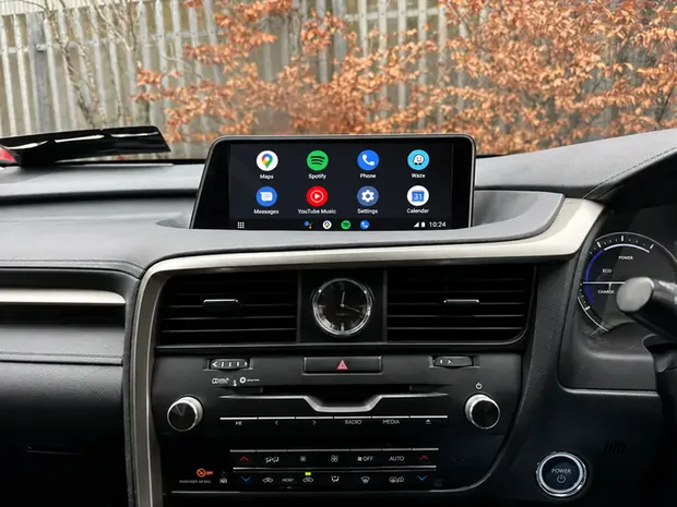 Android Auto home screen with Maps, Spotify, Phone and Messages icons on a factory car display