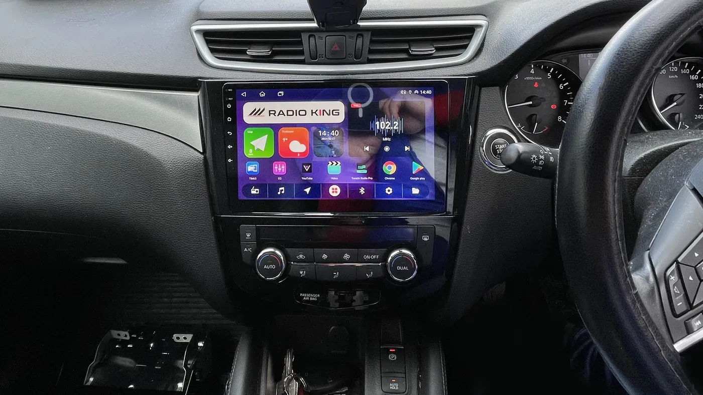 Nissan Qashqai dashboard with a 10-inch Android head unit running CarPlay, fitted at the Radio King workshop