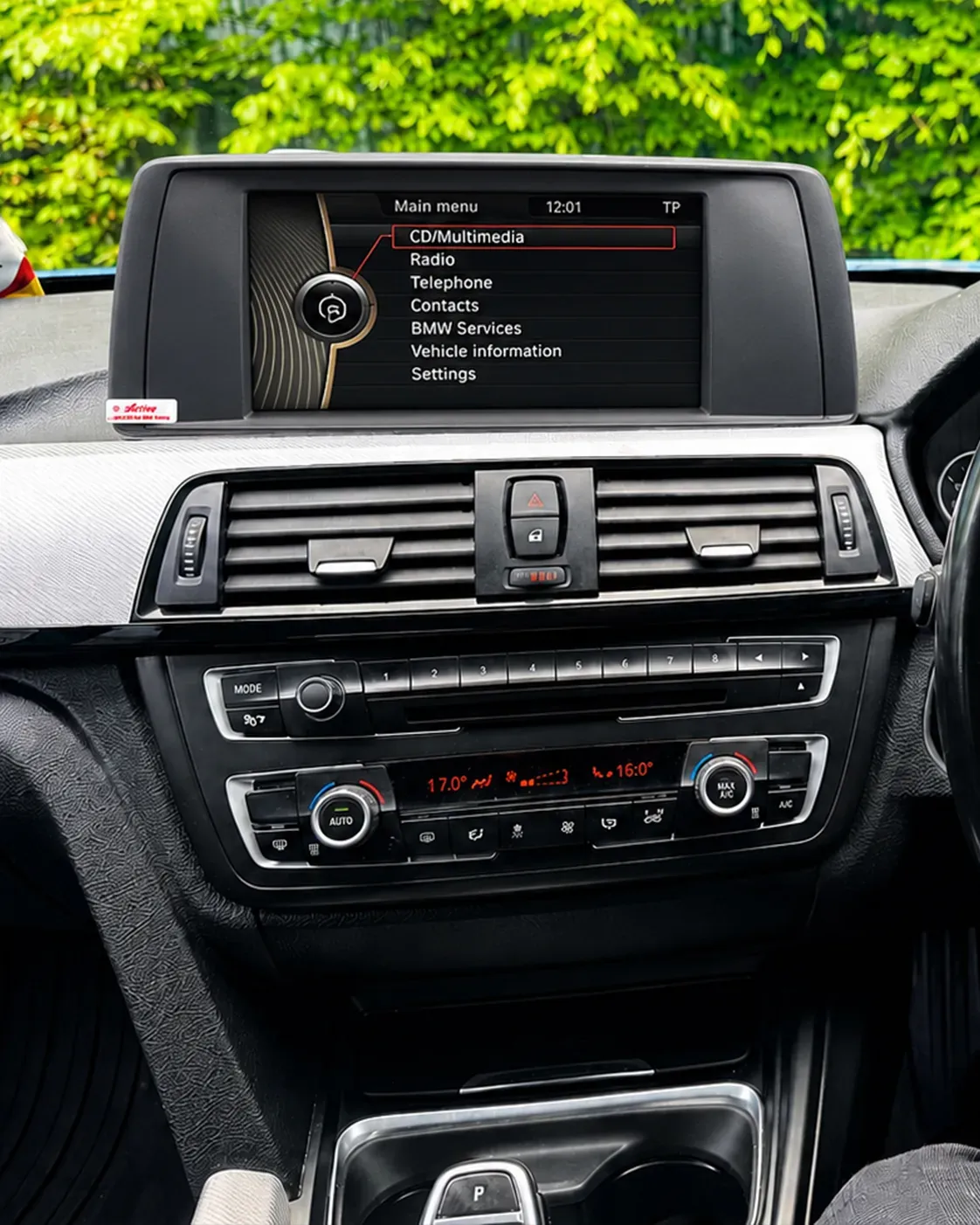 BMW factory iDrive radio menu before Apple CarPlay upgrade in Dublin