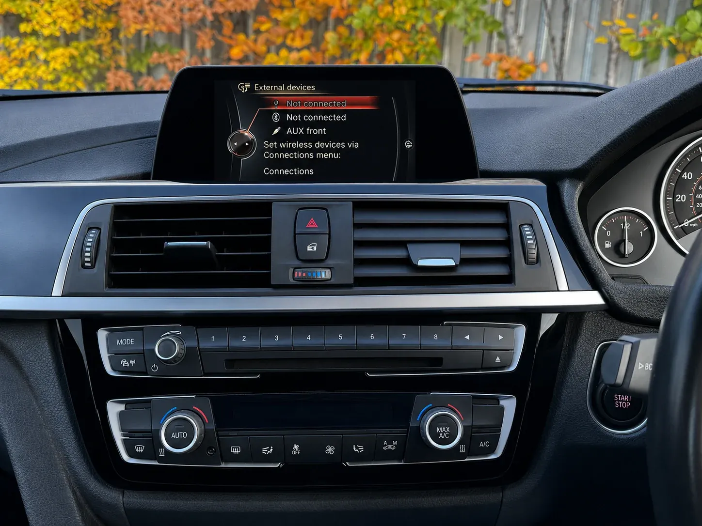 BMW factory screen showing the standard menu before Apple CarPlay was added