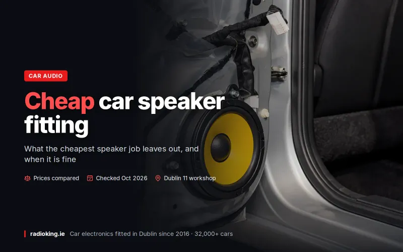 New door speaker on an adapter ring inside an open car door during an installation in Dublin