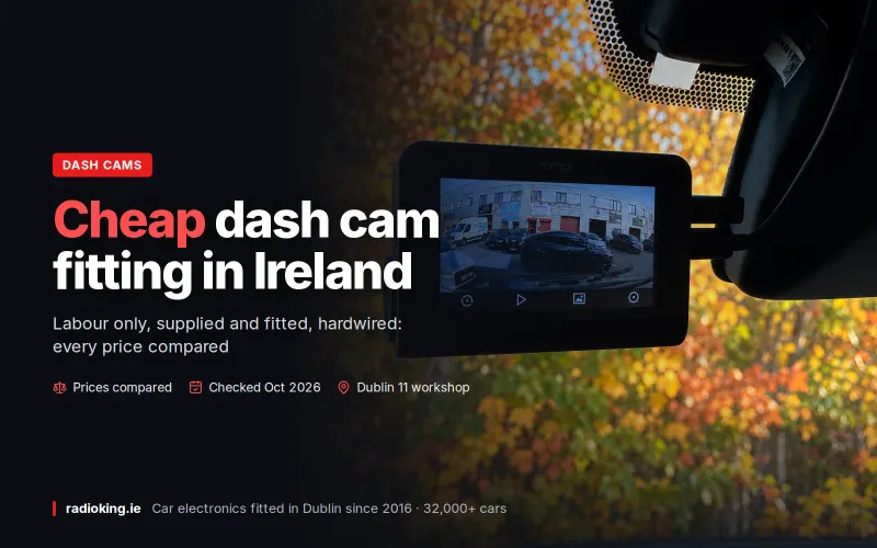 70mai dash cam fitted behind the rear-view mirror with autumn trees outside the windscreen in Dublin