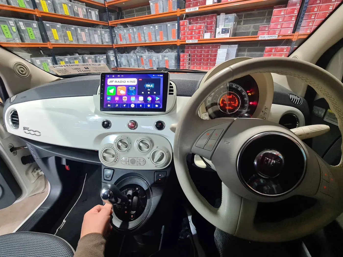 Fiat 500 with a Radio King Android touchscreen running CarPlay in the Dublin workshop