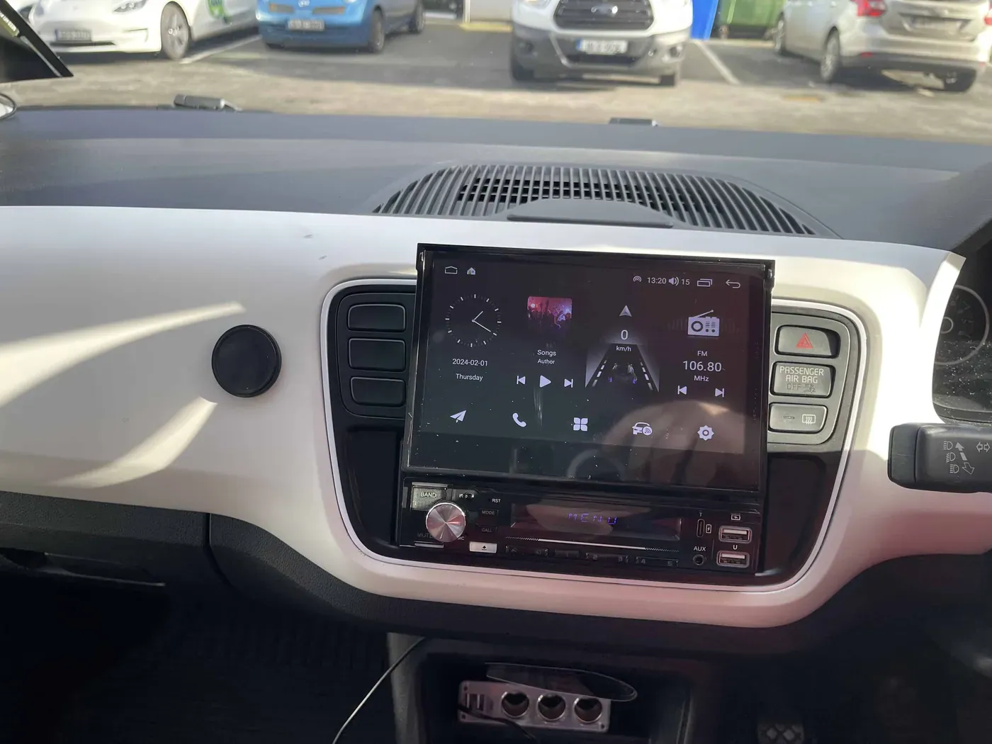 VW up! with a flip-out single-DIN Android screen fitted by Radio King