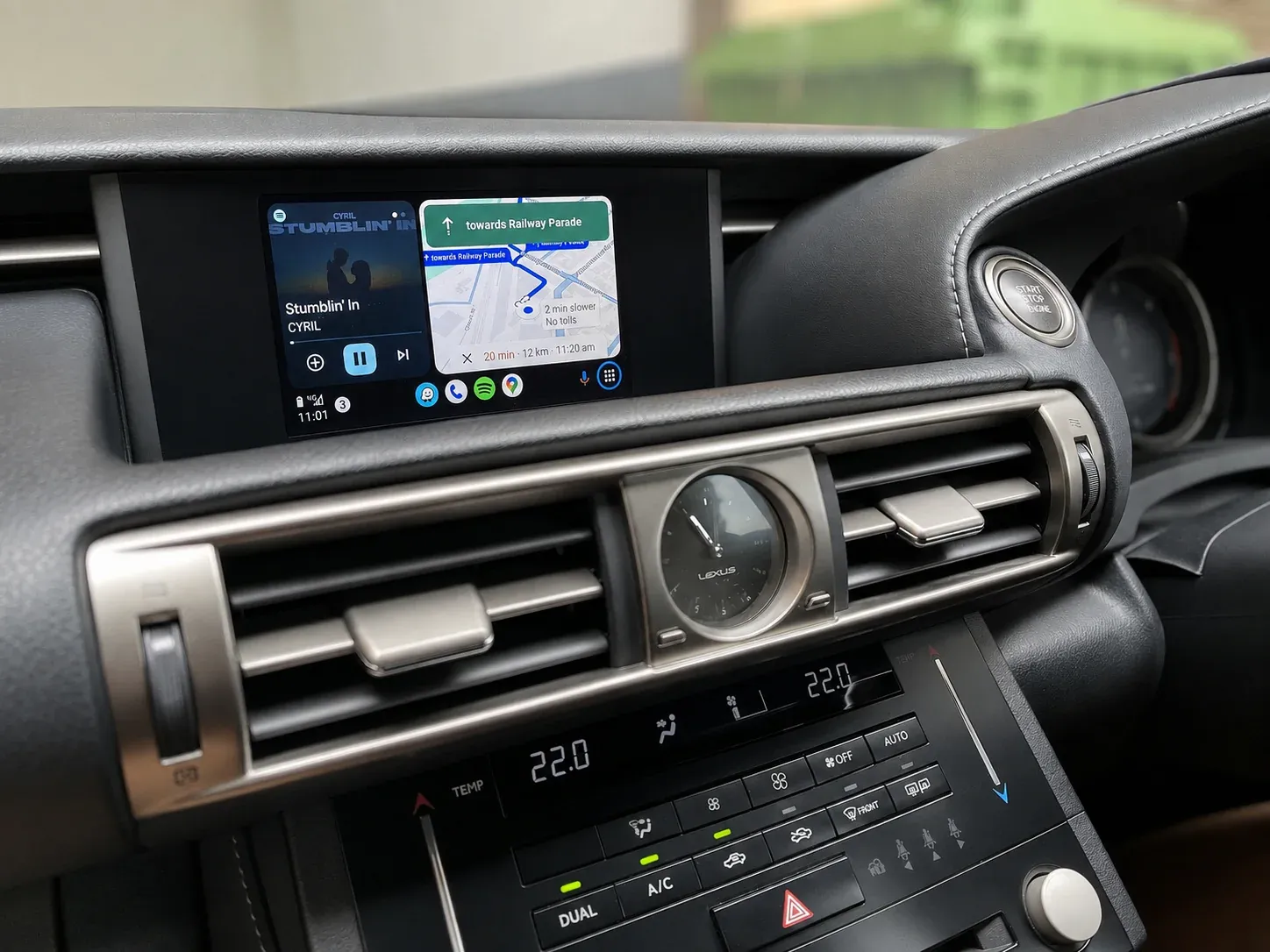 Android Auto showing music and Google Maps on a Lexus factory screen in Dublin
