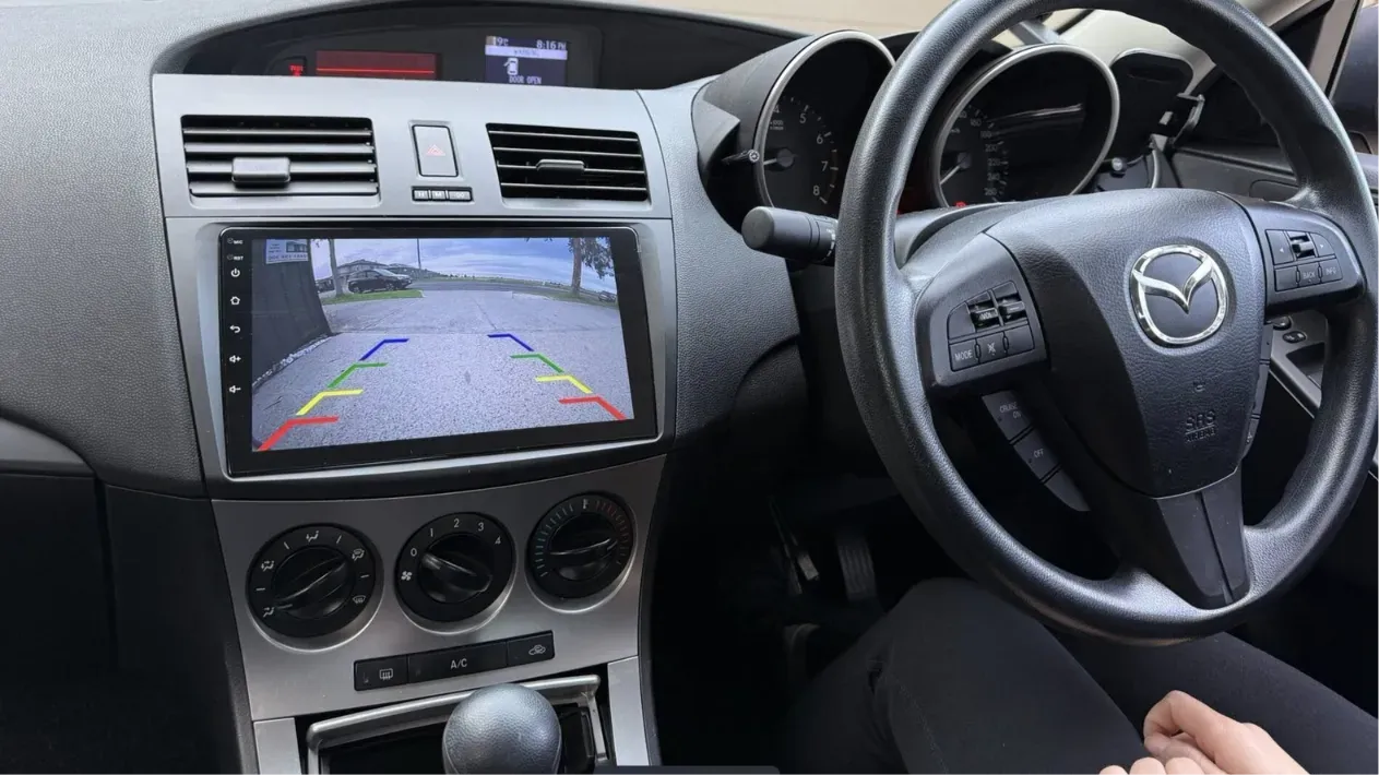 Mazda 3 reverse camera with parking guidelines on an aftermarket touchscreen fitted in Dublin