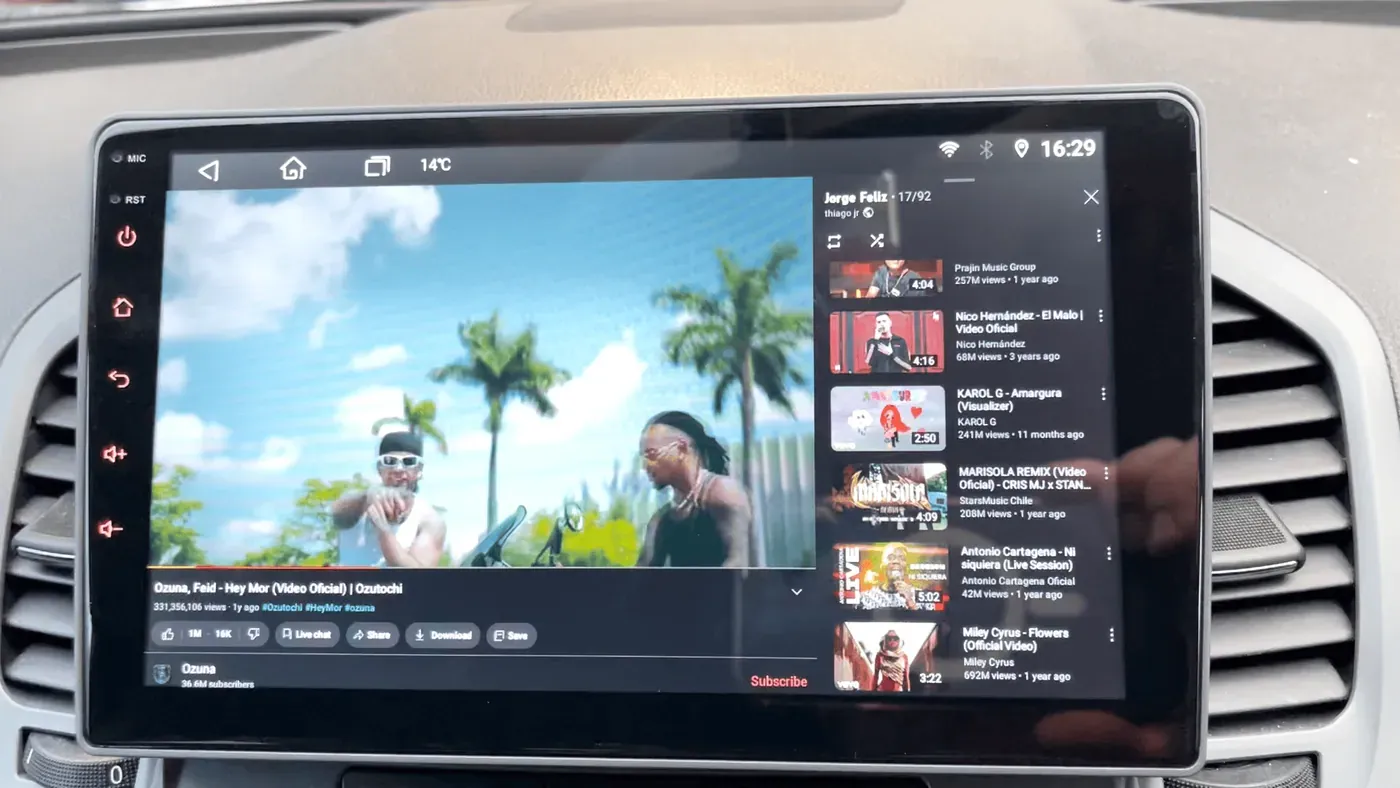 YouTube playing on a 10-inch Android head unit while the car is parked