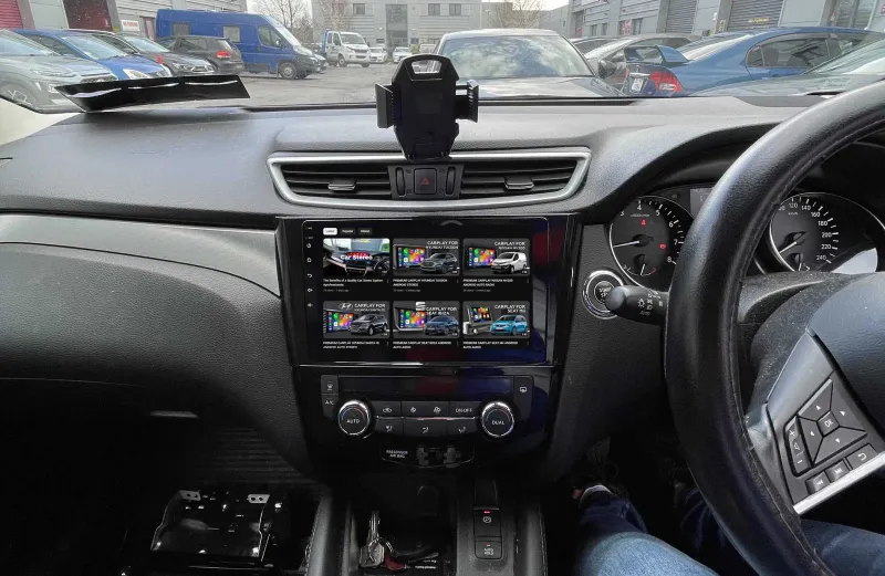 Nissan Qashqai with an Android head unit playing YouTube while parked