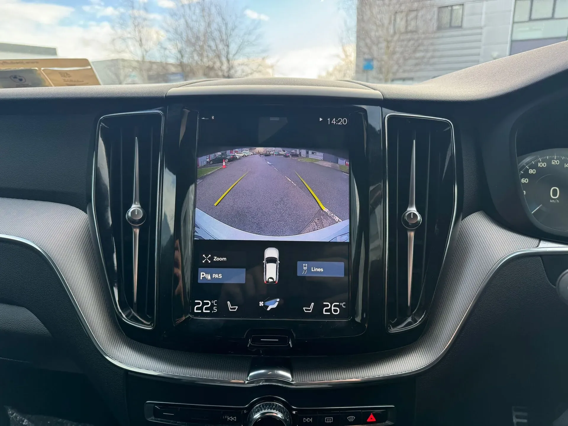 Volvo XC60 reverse camera integrated into the factory portrait screen with parking assist