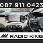 Android car stereo with CarPlay system installed in vehicle dashboard.