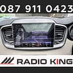 Android car radio with CarPlay system installed in a vehicle dashboard.