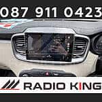 Android car radio with CarPlay system installed in vehicle dashboard.