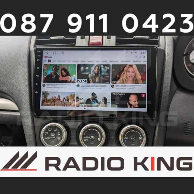 Android car radio with CarPlay system on a vehicle dashboard, touchscreen display showing YouTube interface.